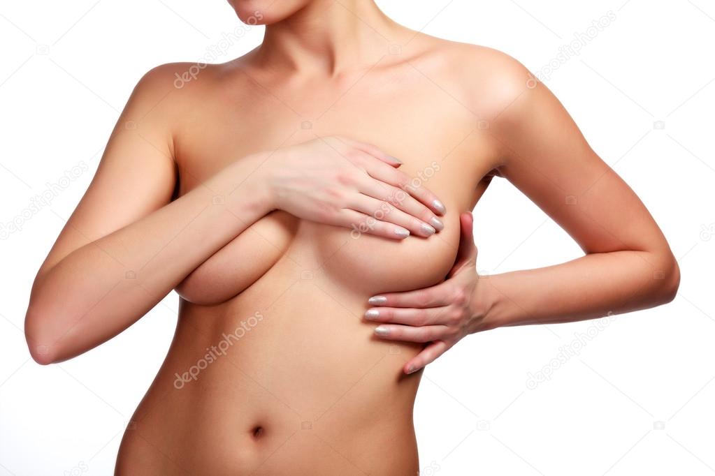 Woman controls her breasts for cancer