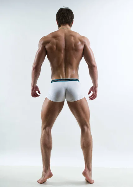 Muskulös Männlich Modell Vorführung Seine Rücken — Stockfoto