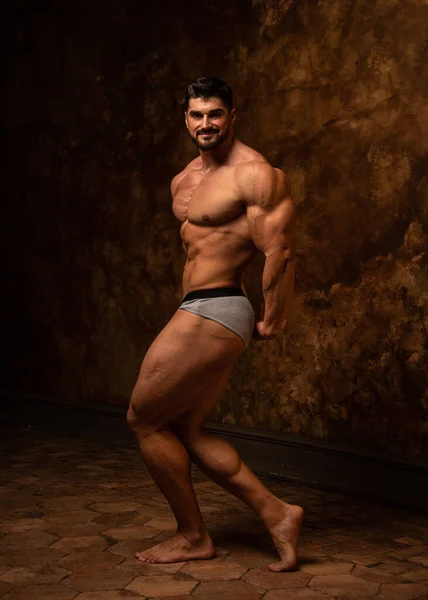 Fitness male model in studio