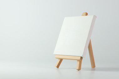 Painting easel with empty canvas