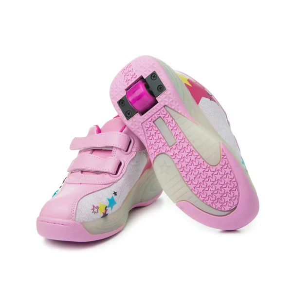 Pair of pink heelys — Stockfoto
