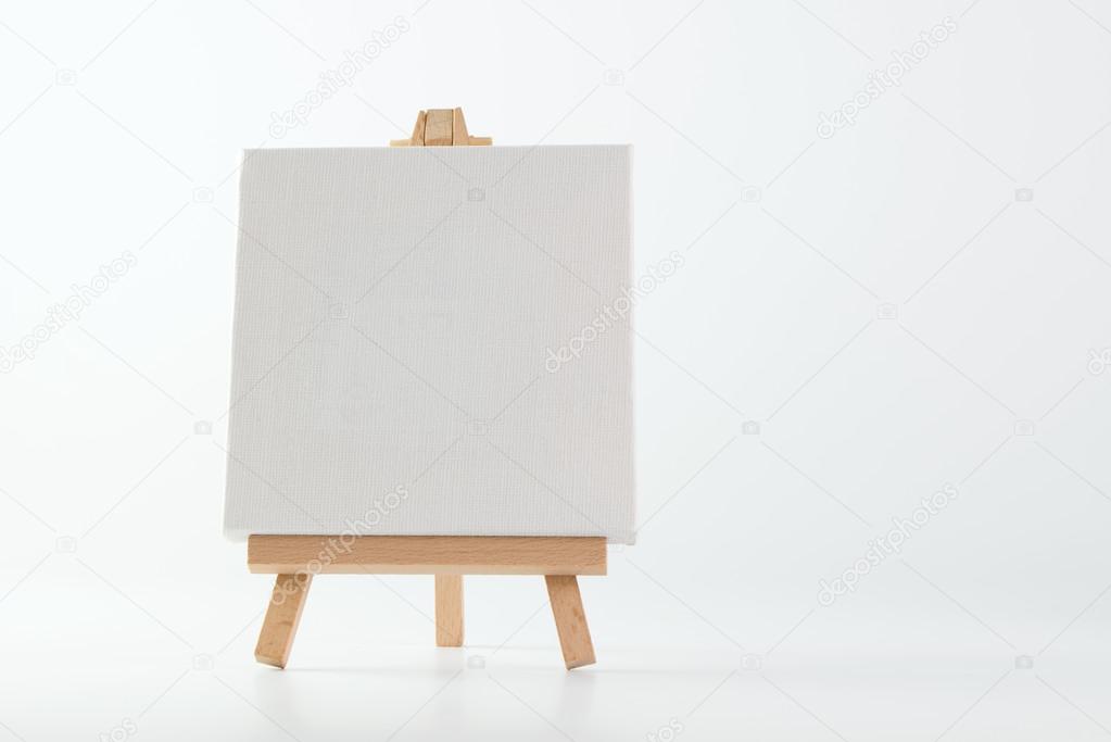 Painting easel with empty canvas