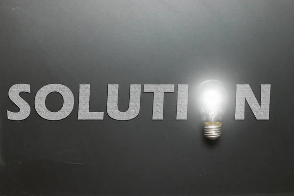 Solution concept using lightbulb — Stock Photo, Image