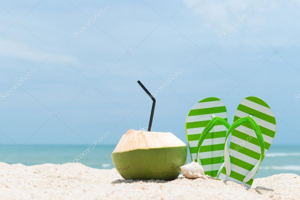Summer beach with coconut and sandal