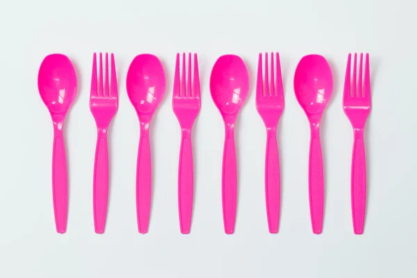 Plastic spoons and forks — Stock Photo, Image