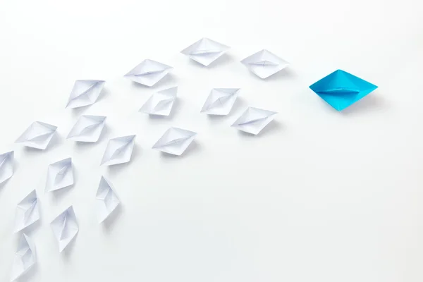 Leadership concept illustrated with paper ships — Stock Photo, Image