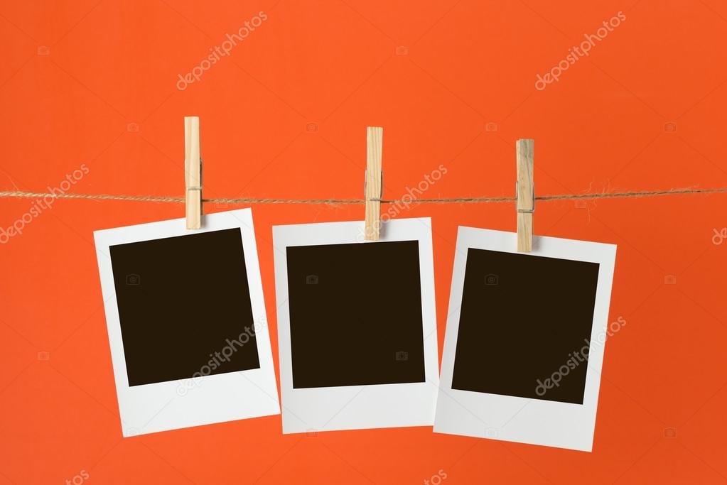 Photos hanging on rope Stock Photo by ©shirotie 122873318