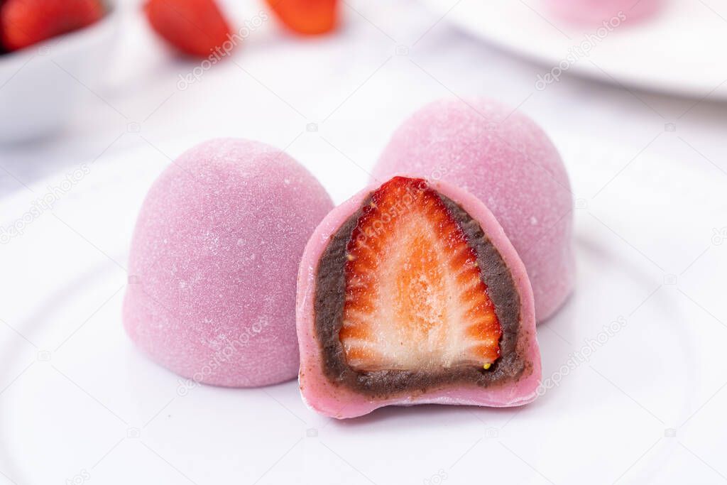 Japanese traditional sweet daifuku with fresh strawberry