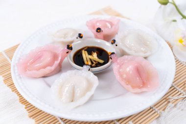 Chinese Har Gao Dim Sum dumplings in the shape of a swan clipart