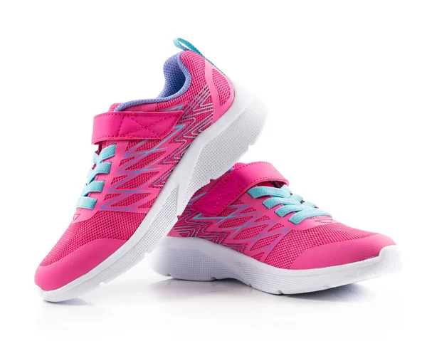 Paar rosa Laufschuhe auf weißem Hintergrund — Stockfoto