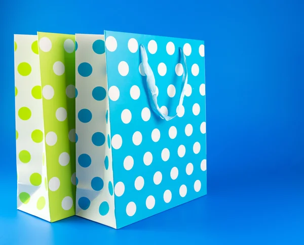 Sacchetto regalo a pois blu e verde — Foto Stock