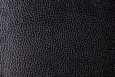 Giyinik deri. Soyut siyah arkaplan.