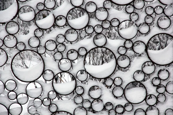 Nieve en la cerca.Fondo de invierno . — Foto de Stock