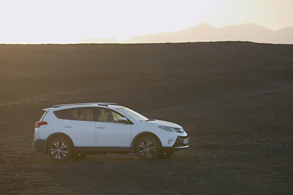 Toyota RAV4 in flaring sunlight — стокове фото