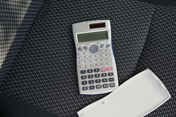 Calculadora en un asiento — Foto de Stock