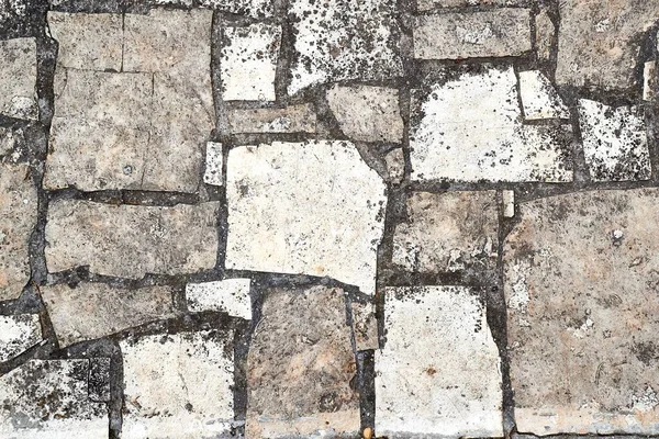 Stone pavement broken near construction — Stock Photo, Image