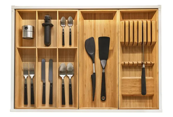 Minimalist kitchen tools put away in a drawer