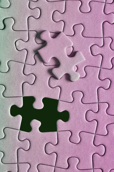 Jigsaw puzzle background, almost done — Stock Photo, Image