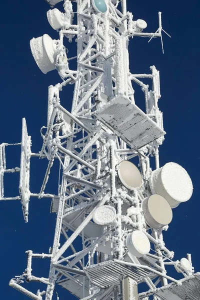 Transmitter tower frozen in winter frost — Stock Photo, Image