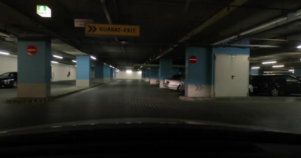 Driving in a parking lot basement — Stock Video