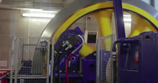 Industrial flywheel spinning for a cable lift machinery — Stock Video