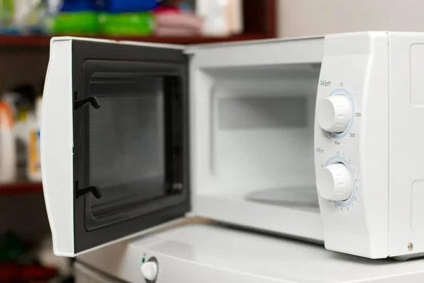 Microwave oven open door — Stock Photo, Image