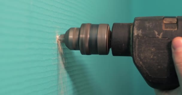 Drilling hole in wall in slow motion — Stock Video