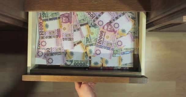 Banknotes stashed away in drawer, Hungarian Forints — Stock Video