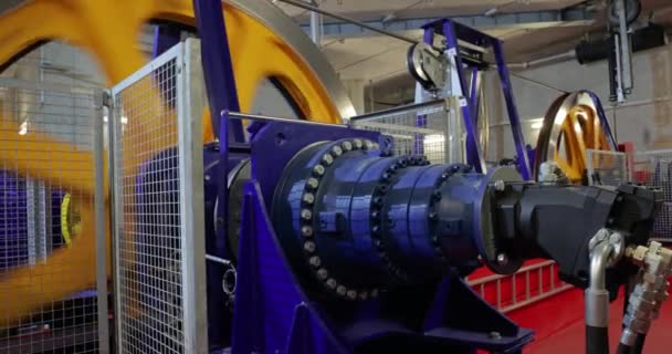 Industrial flywheel spinning for a cable lift machinery — Stock Video