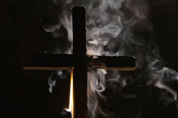 Burning cross falling down