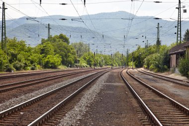 Railroad tracks with mountains