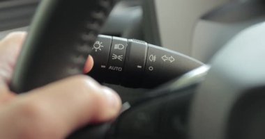 Car turn signal indicator lights used during driving, turning left