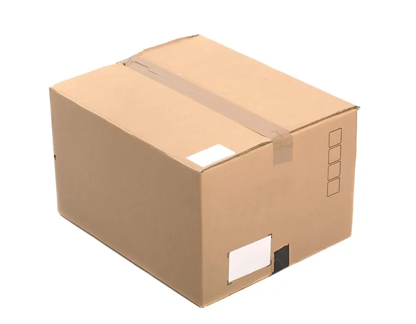 Неоткрытая картонная коробка — стоковое фото