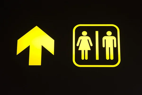 Toilet sign with arrow — Stock Photo, Image