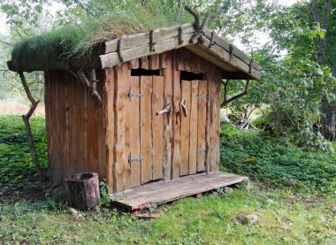 Outdoor toilet of wood clipart