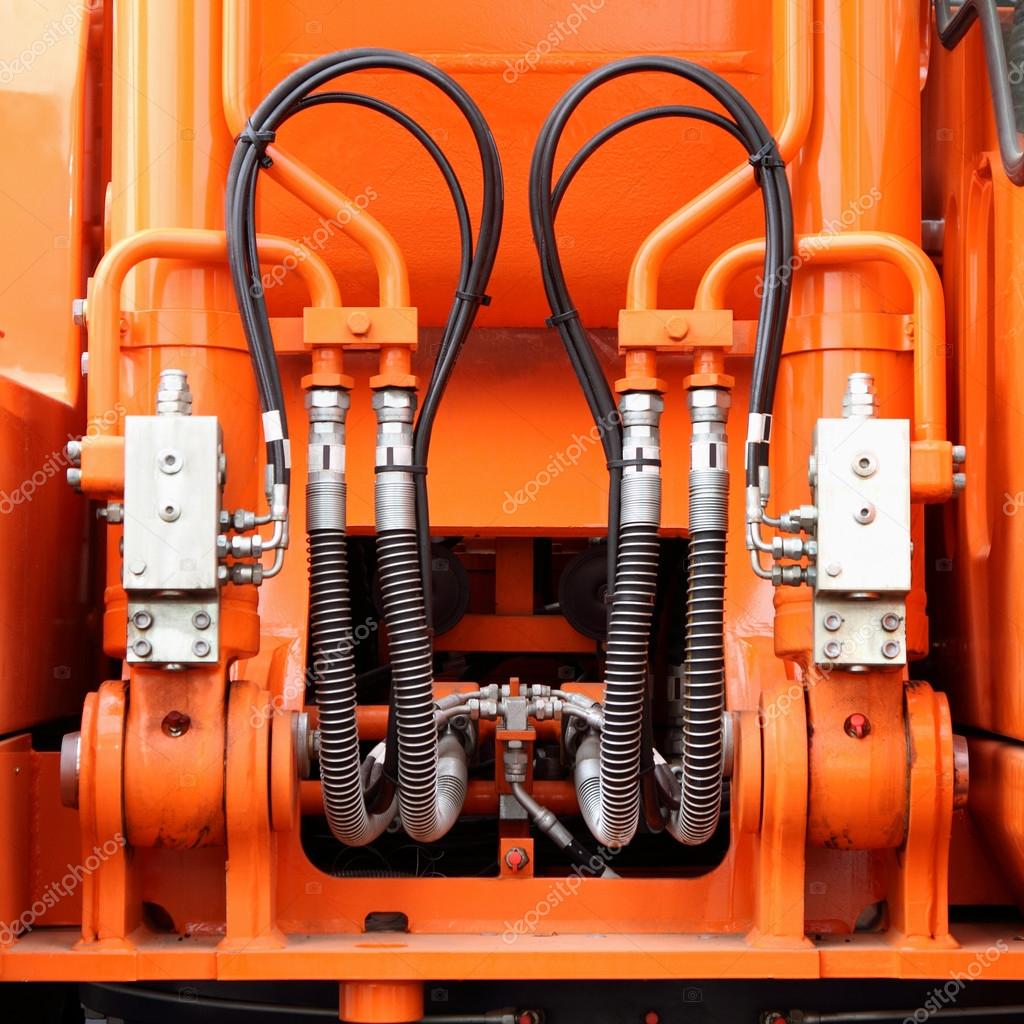Hydraulic mechanisms and hoses — Stock Photo © kamski 66658575