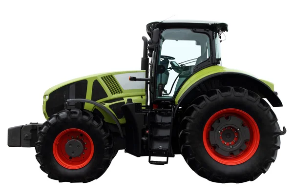 Зеленый трактор — стоковое фото