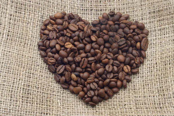 Corazón de granos de café Imagen de stock