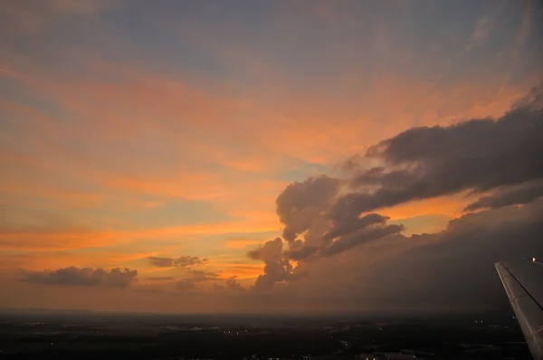 Sunset from an airplane — Stock Photo, Image