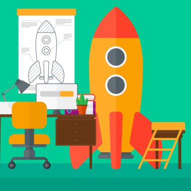 Background of workspace with business start-up rocket.