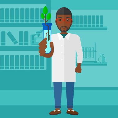 Test tüplü laboratuar asistanı.