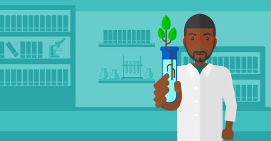 Test tüplü laboratuar asistanı.