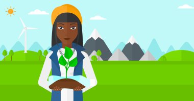 Şişede büyüyen bitki kadınla.