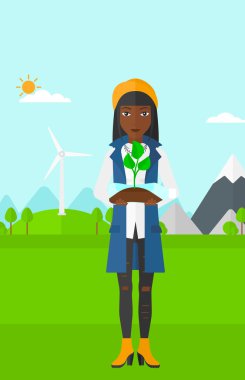 Şişede büyüyen bitki kadınla.