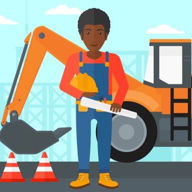 Kask ile mühendis ve blueprint.