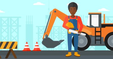 Kask ile mühendis ve blueprint.