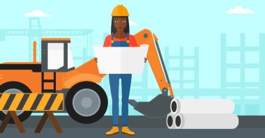 Bir plan tutan mühendisi.