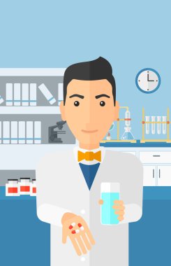 Pharmacist giving pills.