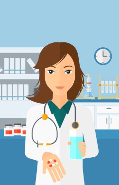 Pharmacist giving pills.