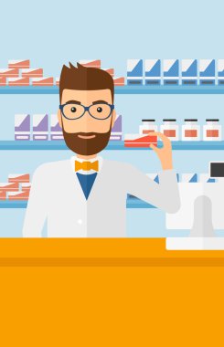 Biraz ilaç gösterilen eczacı.